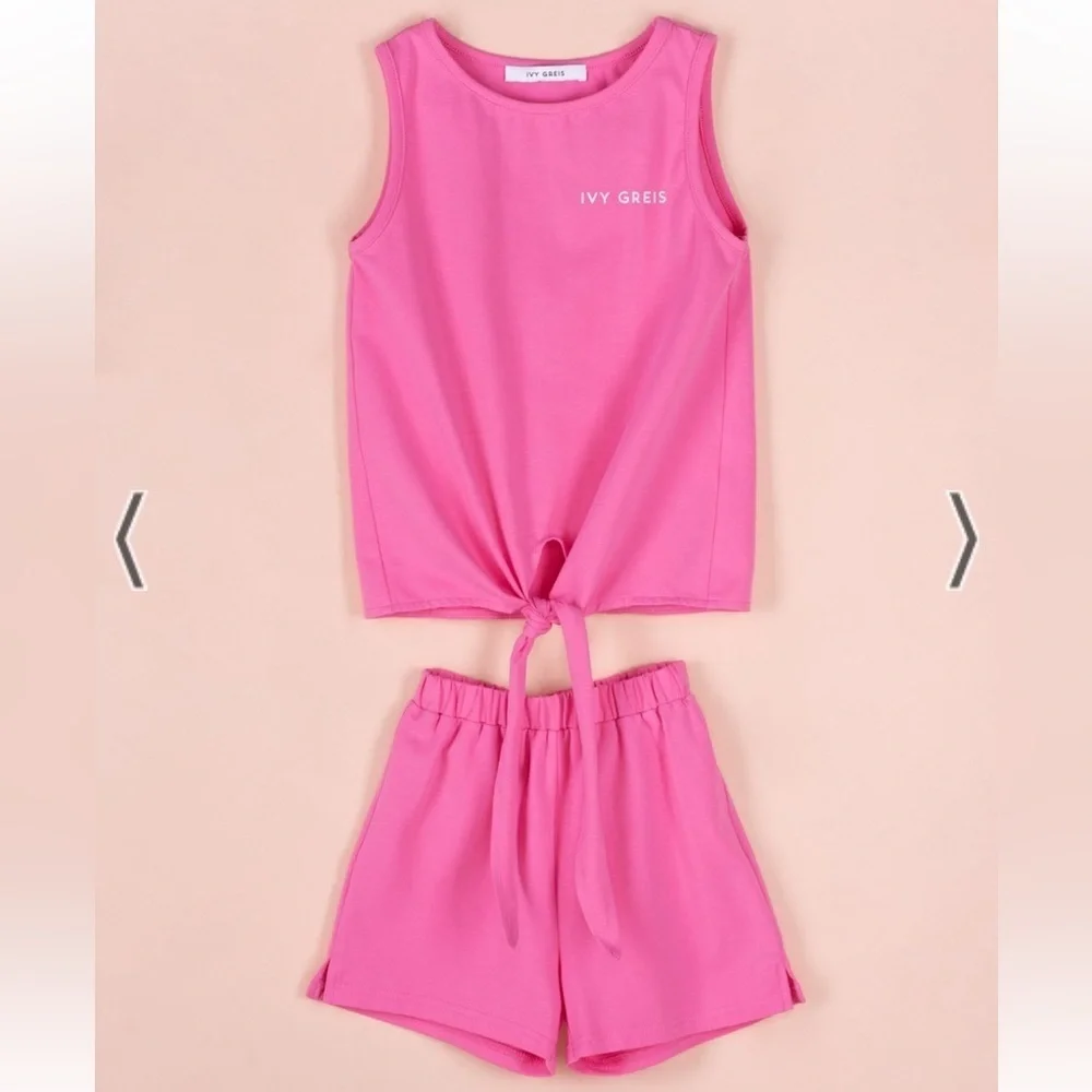 Girls pink top and shorts set in size 4T